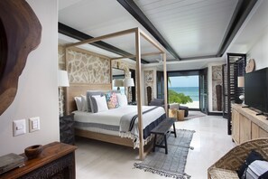 Ocean-view master bedroom with king-size bed