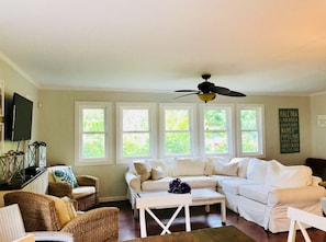 Living room area is air conditioned for cool escape after a day in the sun