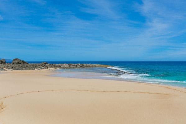 Just steps from some of the most beautiful coastline on Oahu