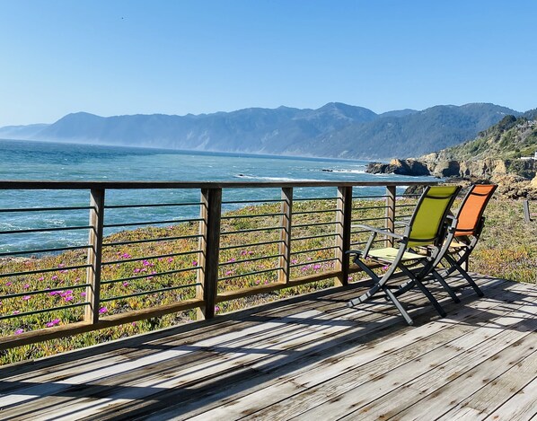 Back deck overlooking the bay only 30 feet away. 
