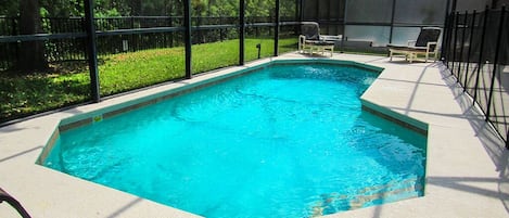 Private pool with conservation view.