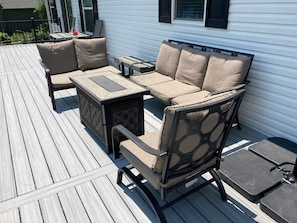 Deck seating with propane fire place