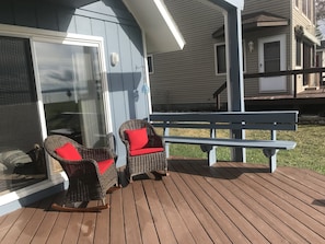 Rocking chairs on the deck waiting for you to relax