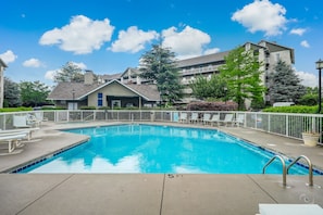 Pool Daze - Enjoy your day lazing in the sun by our sparkling pool with conveniently placed lounge chairs!