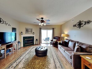 Living Room - Balcony Access, Smart TV, Fireplace + Sofa Sleeper