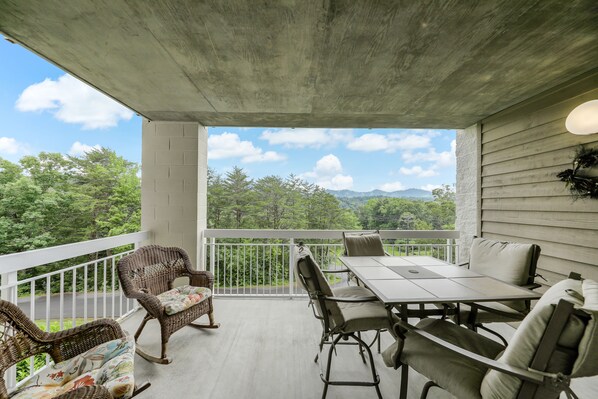 Easy Access - The living room provides quick and easy access to the patio where you can sit and enjoy the cool breeze while sharing stories and laughs with friends.