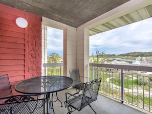 Take in the View - Creekside Hideaway’s covered balcony is sure to be one of your favorite spots. You may even take most of your meals out there!