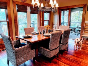 Open concept kitchen to dining, great room, screened porch