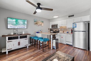 Fully equipped kitchen area with drip coffee maker 