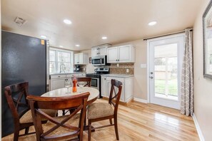 Kitchen / dining area and door to back deck