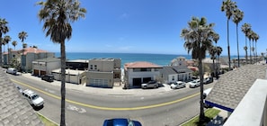 Panoramic ocean view all the way to the pier.