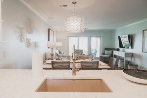 kitchen looking towards living area dn oceanfront view