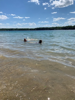 Plenty of space for kids to play in shallow water at the shore.