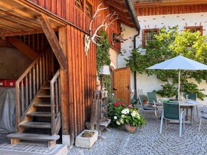 Building, Plant, Flower, Property, Flowerpot, Wood, Architecture, Chair, Leisure, Window