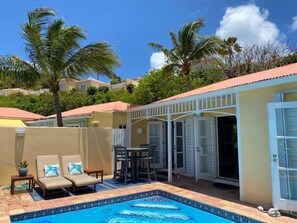 Private Patio with Table for 4 and lounge chairs