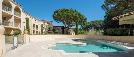 Sky, Plant, Building, Azure, Window, Water, Tree, Shade, Swimming Pool, Urban Design