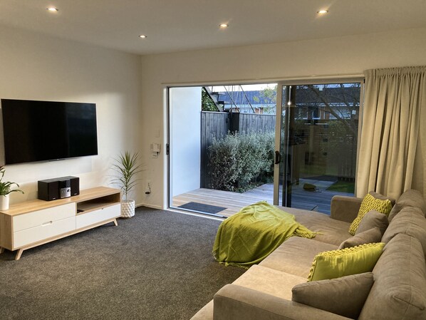 Lounge, indoor/outdoor flow to front deck