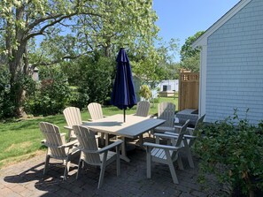 Outdoor dining for 8, additional chairs available.