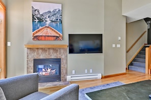 Living Room - Gas Fireplace, 50" HDTV, Sofa with Queen Sz pull-out bed, A/C, Fan