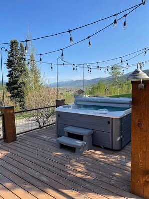 Enjoy a soak in the hot tub morning, noon or night.