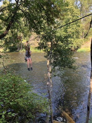 Professionally installed Ziplines across the River. (Arrange rides with owner.)