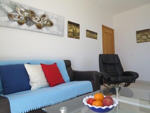 Living area. With electric massage chair!