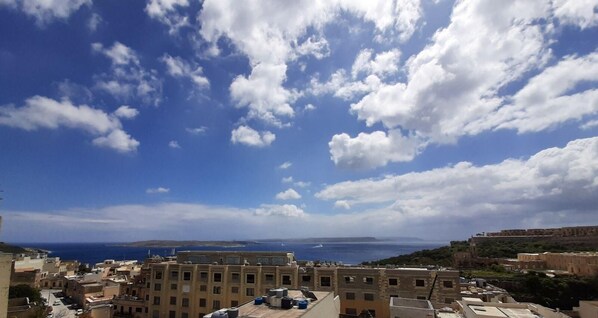 Balcony. Blue ocean view from apartment