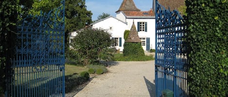 External view of the building. Gate of Hunting Lodge Le Logis.
