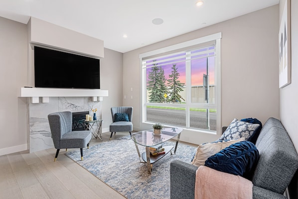 Experience the pleasure of a spacious open floor plan, carefully designed to facilitate easy family gatherings and the making of lasting memories.