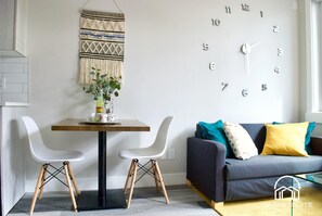 Plenty of natural light bathes the living and dining space