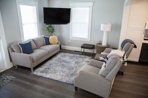 Two chairs are available to move into space.
55 inch Smart TV