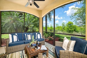 Peaceful private lanai with comfy seating 