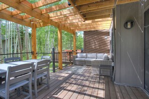 The large deck is the perfect place to enjoy a meal or happy hour outside 