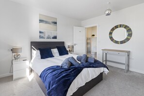 Spacious master bedroom with king size bed and ensuite shower room