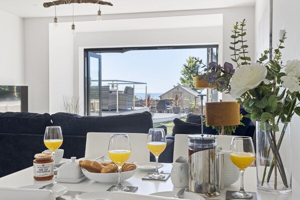 Enjoy sea views over a relaxing breakfast