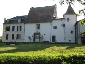 External view of the building. The rear view of the other houses of Hunting Lodge Le Logis