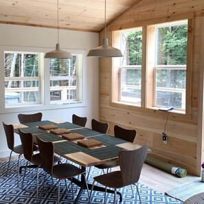 Dining right off the kitchen and open to the living room.