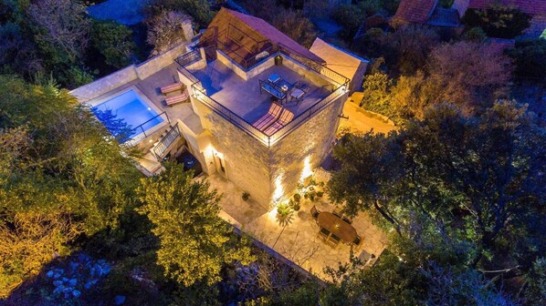 External view of the building. Night birdeye view