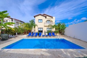 Large garden with private pool, sunloungers, outside dining area and barbecue