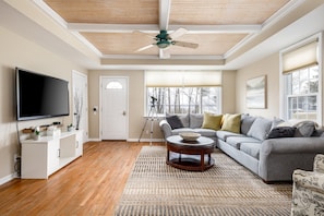 Elevate your living space with timeless charm. Wood-paneled ceilings and rich wood floors seamlessly blend in our open concept design, adding character that's both warm and inviting. Experience the perfect fusion of style and comfort in your living room and kitchen retreat.