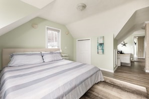Retreat to the upper level where luxury meets comfort. Your haven features a king bed, a pull-out queen futon for added convenience, and a master bath boasting a double vanity and a stylish walk-in tiled shower. Experience the pinnacle of relaxation and sophistication in your private sanctuary.
