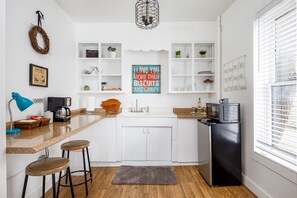 Step into our charming kitchenette – a compact yet efficient space that perfect for whipping up delicious meals and creating memorable moments.