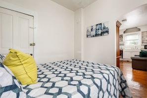 Our cozy bedroom adjacent to the living room offers privacy and relaxation.