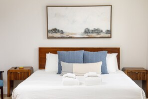 The perfect retreat! Our guest bedroom offers a spacious bed, ample bedside space, and a serene ambiance for ultimate relaxation during your stay.