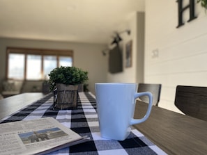 Enjoy a cup of coffee in the sun filled room. 