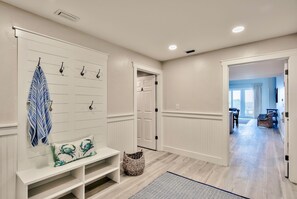 This is the entryway that connects the two units, as well as a door by both dining areas