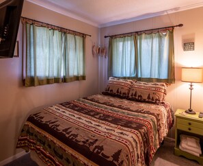 Sweet dreams awaits in this Cozy queen bed.