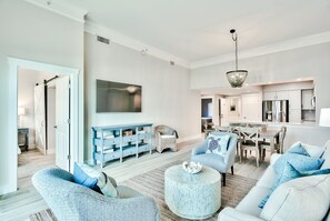 View of the living room leading  into the master bedroom