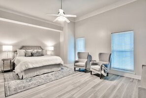 The stunning master bedroom and seating area