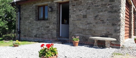 External view of the building. The Barn Annexe on a sunny day